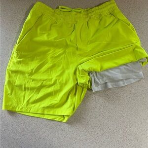 Neon men’s  Lulu lemon shorts.
Size M